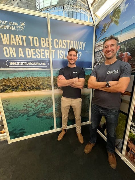 Tom and Nick from Desert Survival, with tools of the trade for surviving on a remote desert island
