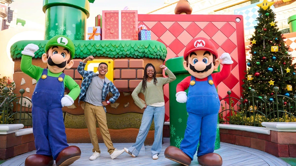 Mario and Luigi with guests in Super Nintendo World during the holidays. Image: Universal Studios Hollywood Mario and Luigi with guests in Super Nintendo World during the holidays. Image: Universal Studios Hollywood
