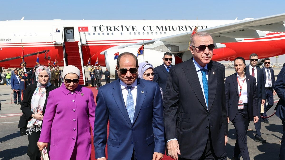 President Recep Tayyip Erdoğan and Egyptian President Abdel-Fattah el-Sissi (R) walk at the airport after a welcoming ceremony, Cairo, Egypt, Feb. 4, 2026. (DHA Photo)