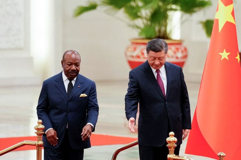 Gabonese President Ali Bongo Ondimba is led by Chinese President Xi Jinping during a welcome ceremony at the Great Hall of the People in Beijing, China, April 19, 2023. Gabonese President Ali Bongo Ondimba is led by Chinese President Xi Jinping during a welcome ceremony at the Great Hall of the People in Beijing, China, April 19, 2023.