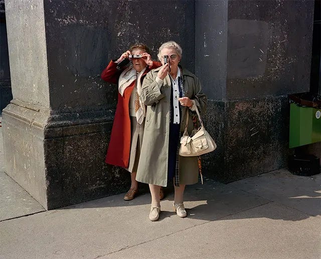 Milan, 1981: Urban elegance captured on the streets of Italy's dynamic fashion capital. Milan, 1981: Urban elegance captured on the streets of Italy's dynamic fashion capital.