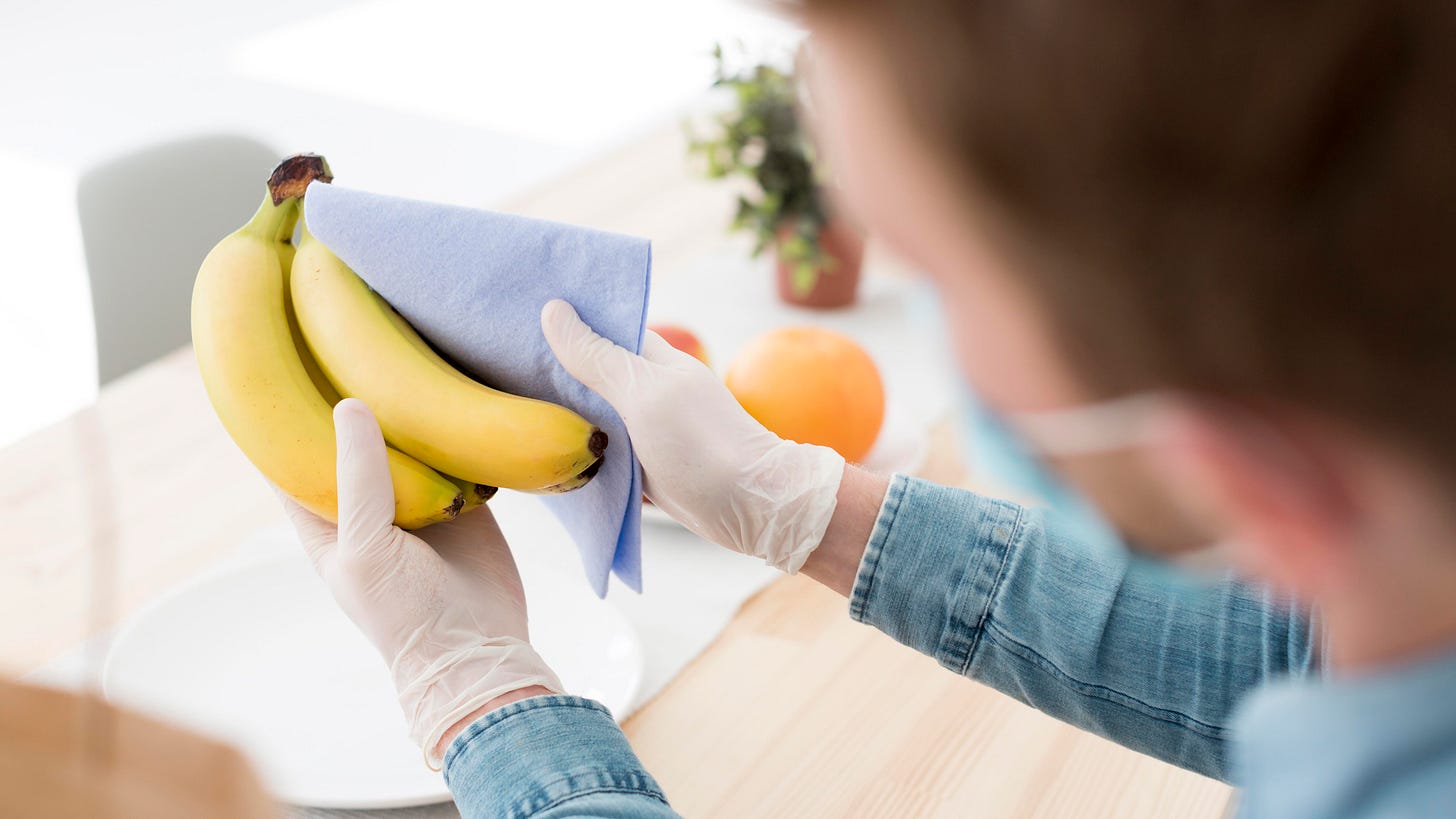 Image by <a href="https://www.freepik.com/free-photo/close-up-man-cleaning-bananas_7713767.htm#query=covid%20cleaning%20produce&position=17&from_view=search&track=ais">Freepik</a>