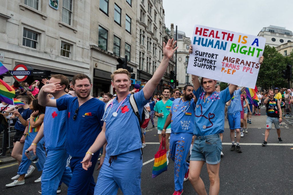 NHS doctors walk in Pride in London