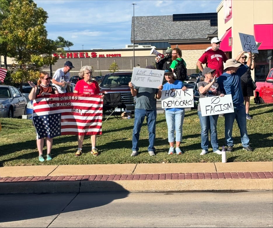 A group of people holding signs AI-generated content may be incorrect.