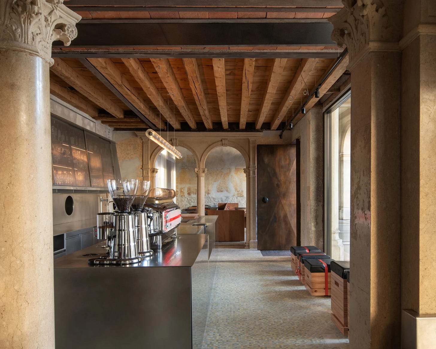 Caffè Nazionale by AMAA in Arzignano Italy, adaptive reuse of 19th-century palazzo with pleated stainless steel walls, okumè plywood ceiling and preserved historical patinas Caffè Nazionale by AMAA in Arzignano Italy, adaptive reuse of 19th-century palazzo with pleated stainless steel walls, okumè plywood ceiling and preserved historical patinas