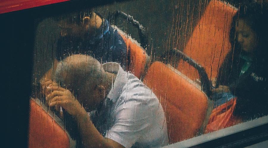 Sad tired man on bus Sad tired man on bus