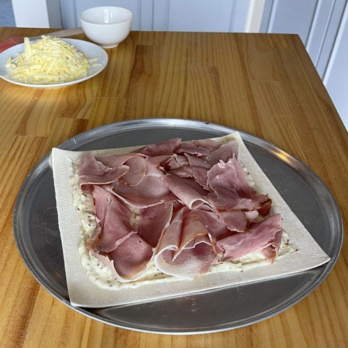 Making of a ham and cheese pie