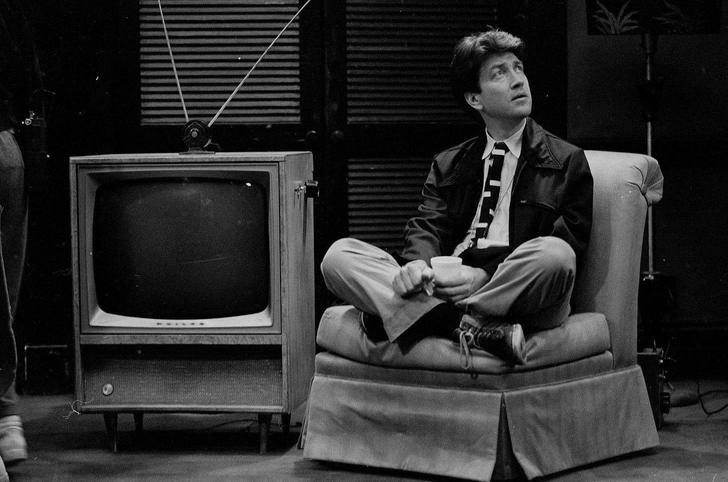May be a black-and-white image of 1 person and television