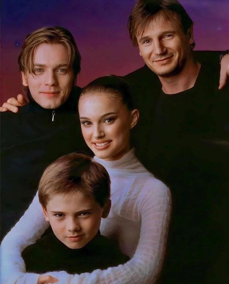 This may contain: two men and a woman posing for a photo with their arms around each other in front of a purple background This may contain: two men and a woman posing for a photo with their arms around each other in front of a purple background