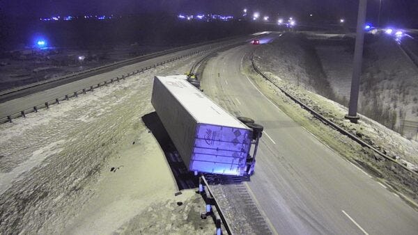 A semitruck is overturned A semitruck is overturned