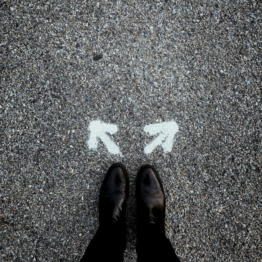 a person standing in the middle of a street