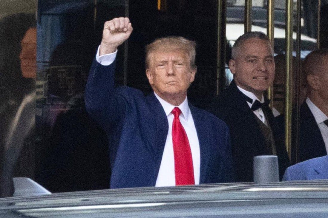 May be an image of 3 people and people standing