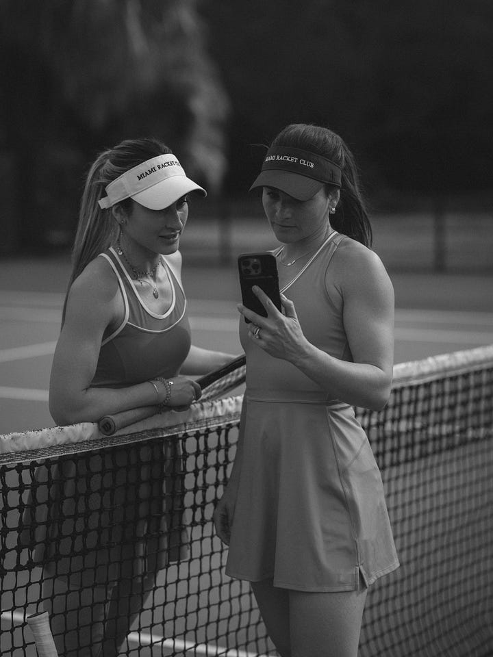 A black and white photo series of men and women playing tennis, modeling Miami Racket Club apparel, and chatting courtside. Mix of action shots, posed portraits, and candid moments, showcasing both athleticism and casual club atmosphere.