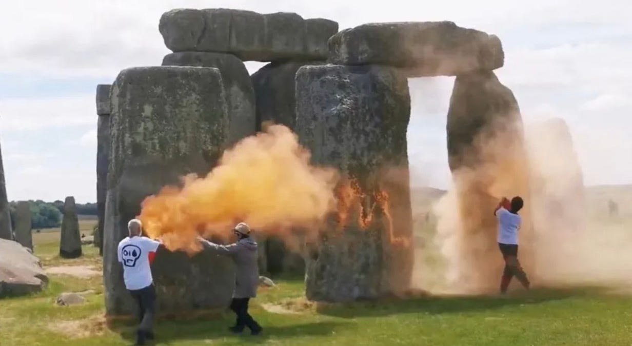 Just Stop Oil Activists Target Stonehenge with Orange Powder Paint