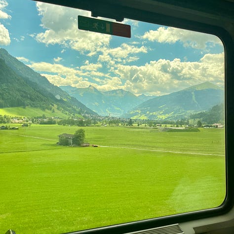 scenic photos of scenery through the train in Slovenia and Austria