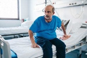 Man on hospital bed