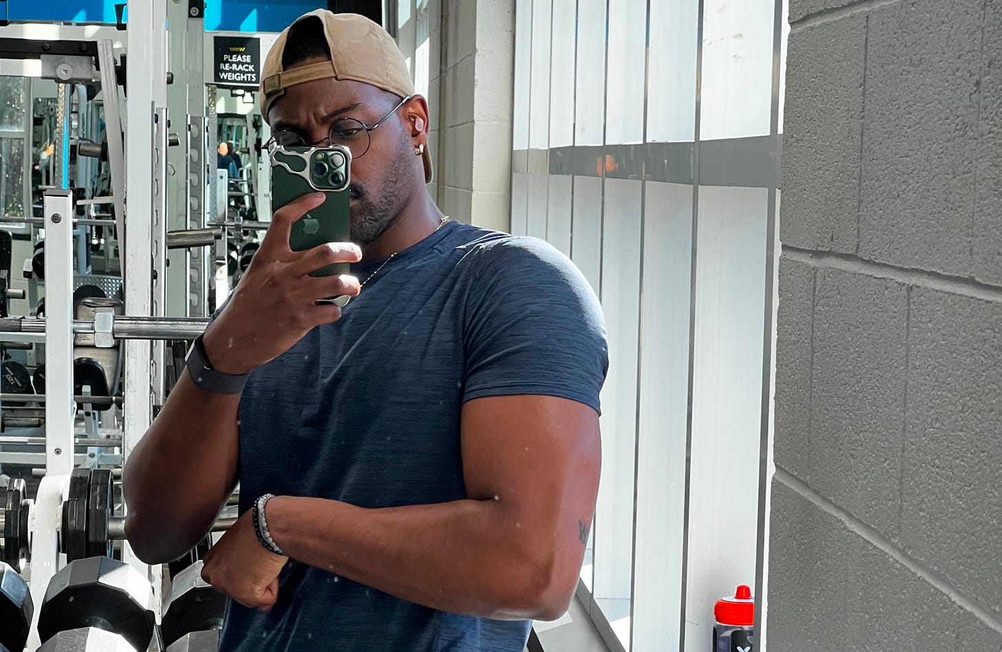 Me flexing my bicep in the gym.