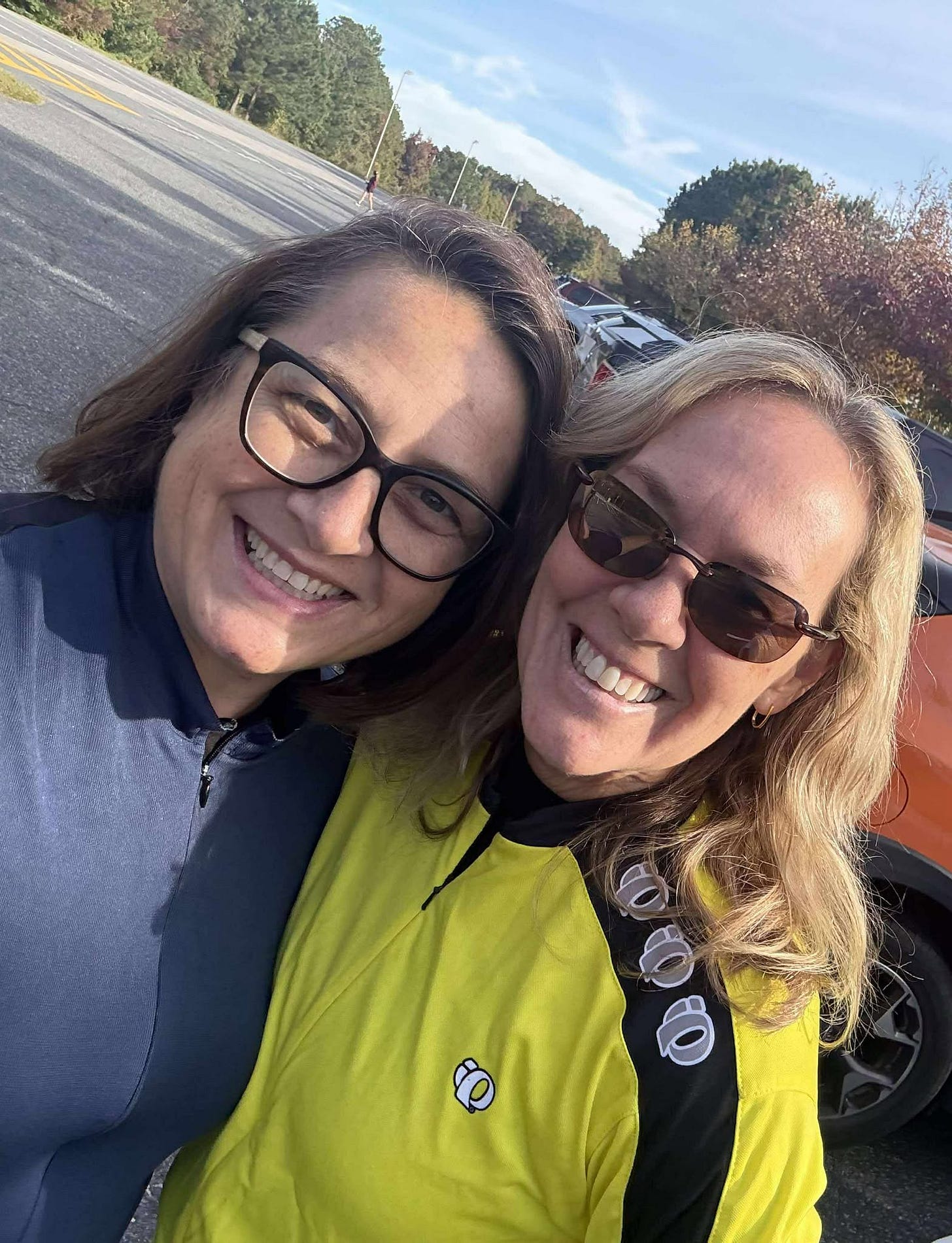 Two ladies on a sunny day in real bicycle clothes. 