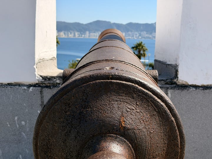 Fuerte de San Diego entrance, cannon, model ship, headdress sculpture