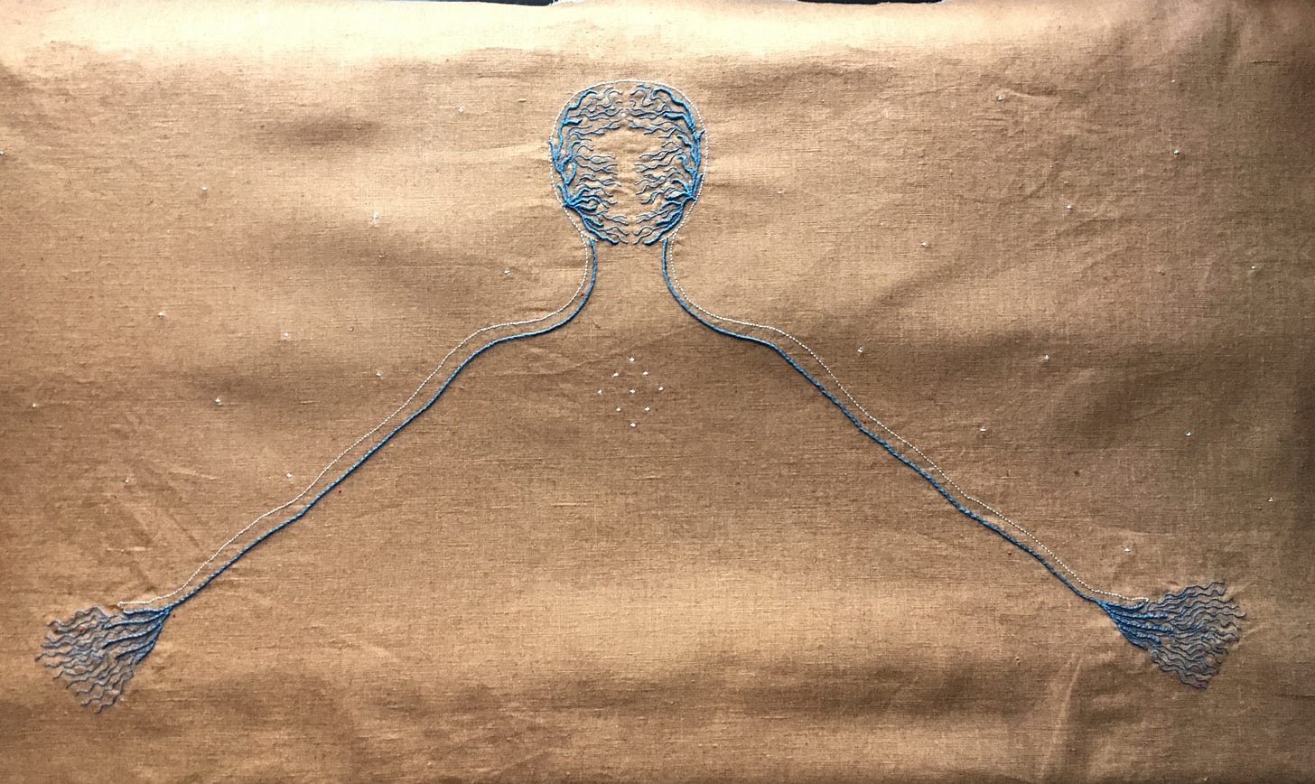stars within, stars without (2017). An embroidery on ochre linen, there is the outline of a head and outstretched arms. Tiny blue filigree decorates the face and hands and there are light coloured stars on the chest area and around the neck.