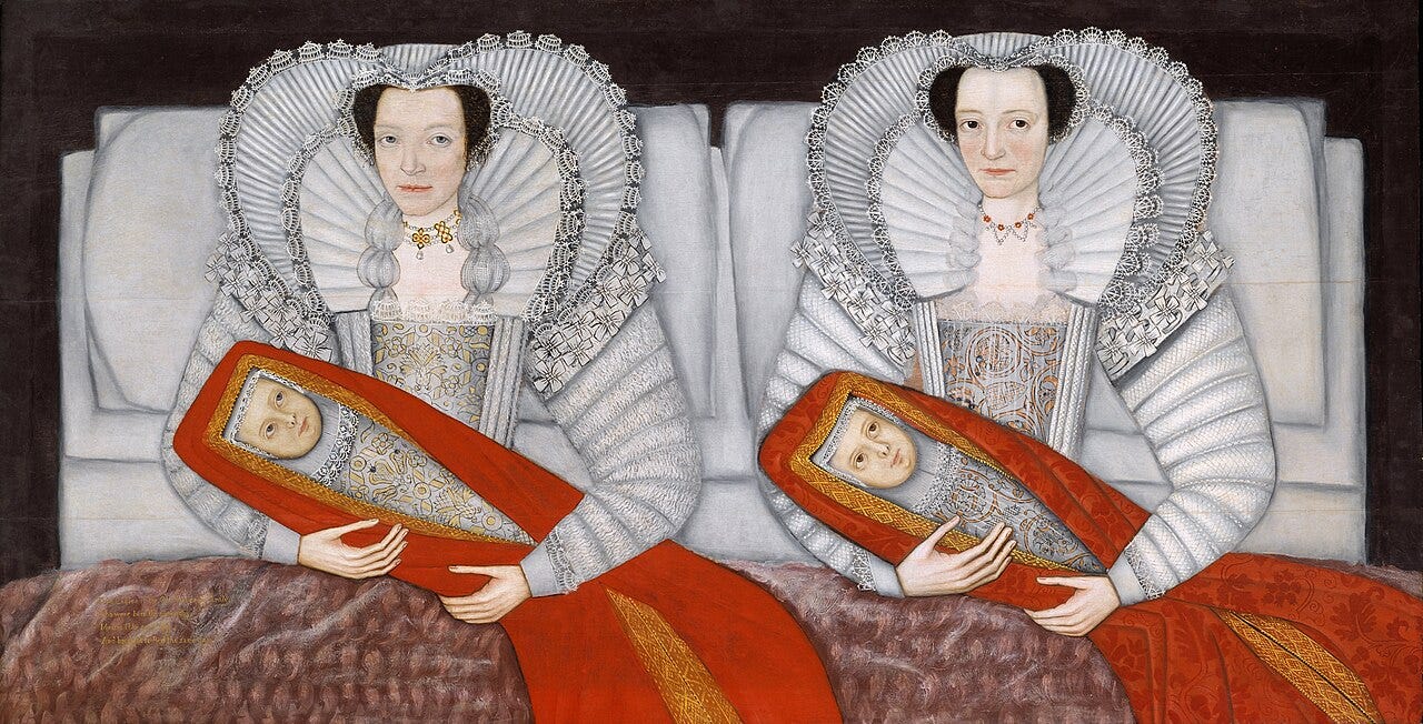 Two women in bed babies