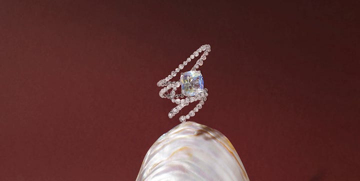 A few of Inesa's favourites from TEFAF: diamond ring by Feng J; earrings by Santi Jewels; earrings by Hemmerle; a brooch by Luz Camino; emerald ring by Forms, Inesa wears jewels by Hemmerle.