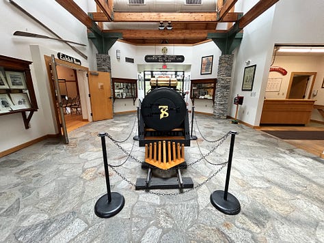 train, picnic tables, display, inside