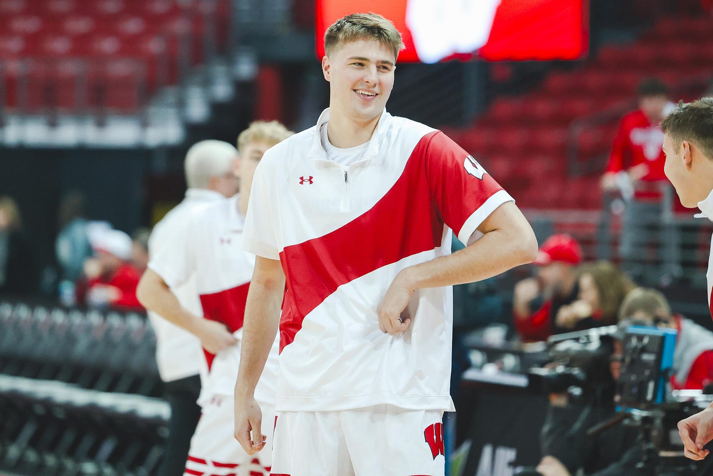 Nolan winter in warmup attire smiling