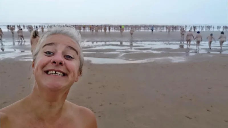 Jax Higginson smiles in a selfie on the beach at dawn as hundreds of nude participants wade into the sea for the annual North East Skinny Dip at Druridge Bay, Northumberland. Jax Higginson smiles in a selfie on the beach at dawn as hundreds of nude participants wade into the sea for the annual North East Skinny Dip at Druridge Bay, Northumberland.