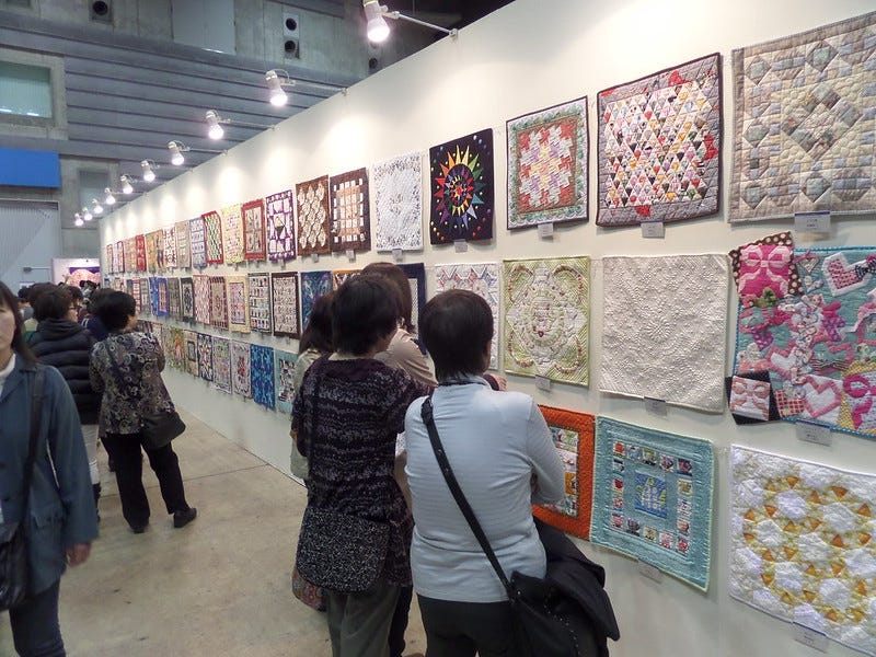 One wall of small quilts One wall of small quilts