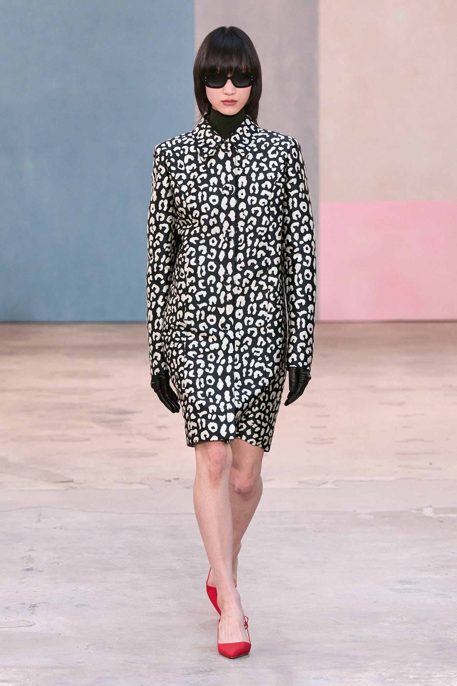 Image may contain Clothing Dress Sleeve Adult Person Long Sleeve Glove Coat Formal Wear Black Hair and Hair Image may contain Clothing Dress Sleeve Adult Person Long Sleeve Glove Coat Formal Wear Black Hair and Hair