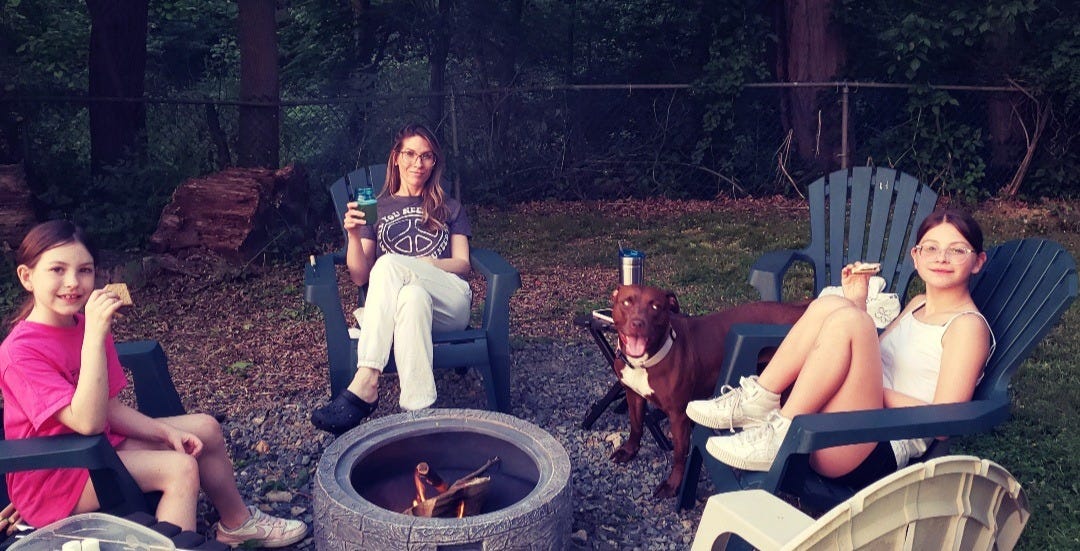 May be an image of 3 people and fire