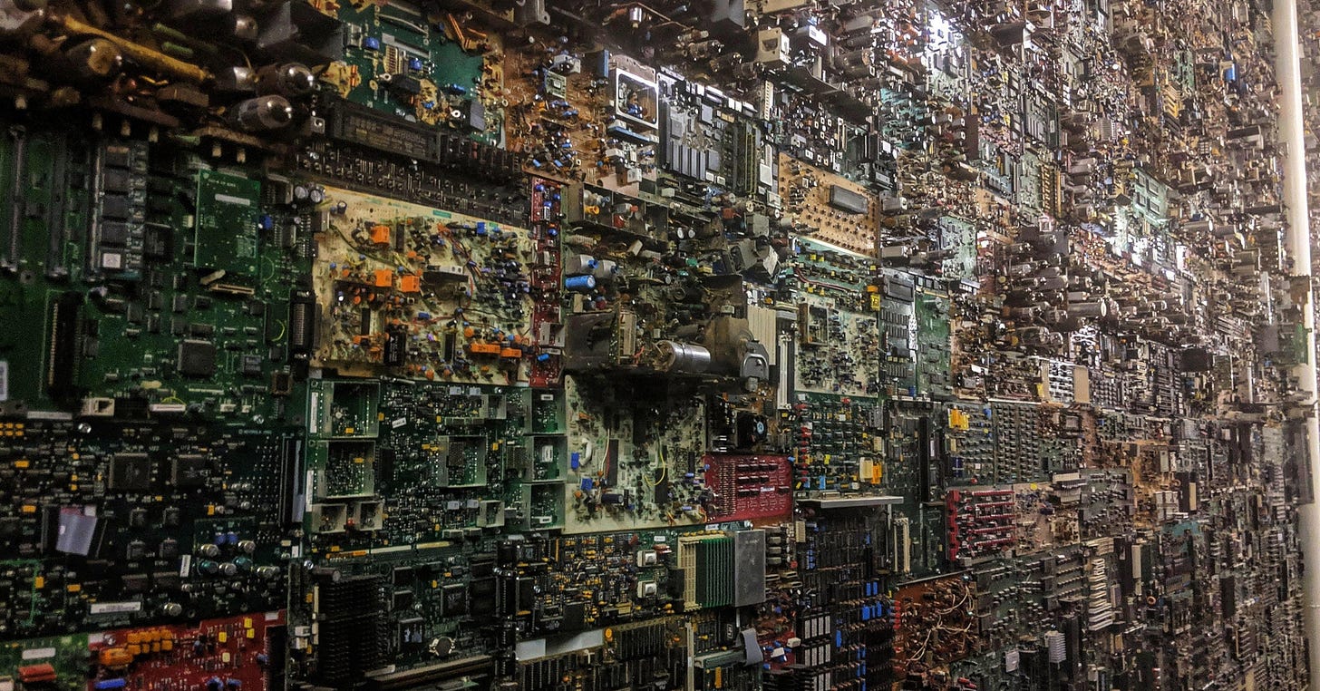 A wall of motherboards straight up looking like an aerial view of a city :  r/LSD