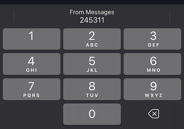 Screenshot of the iOS software keyboard with “From Messages” on the QuickType bar.