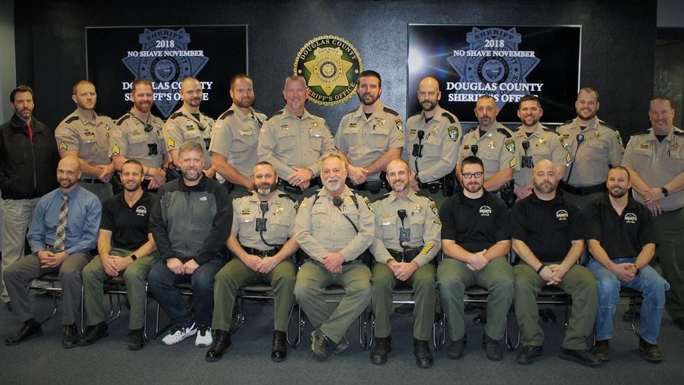 Douglas County deputies skip shaving for month to raise funds for Community Cancer Center Douglas County deputies skip shaving for month to raise funds for Community Cancer Center