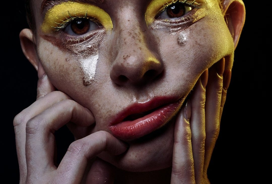 woman with red lipstick and brown eyes