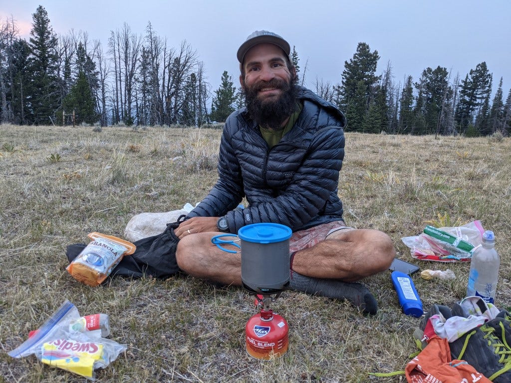Tim cooking in the wilderness.