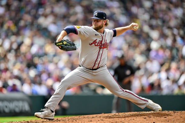 Minter of the Atlanta Braves pitches against the Colorado Rockies in the seventh inning at Coors Field on August 11, 2024 in Denver, Colorado.