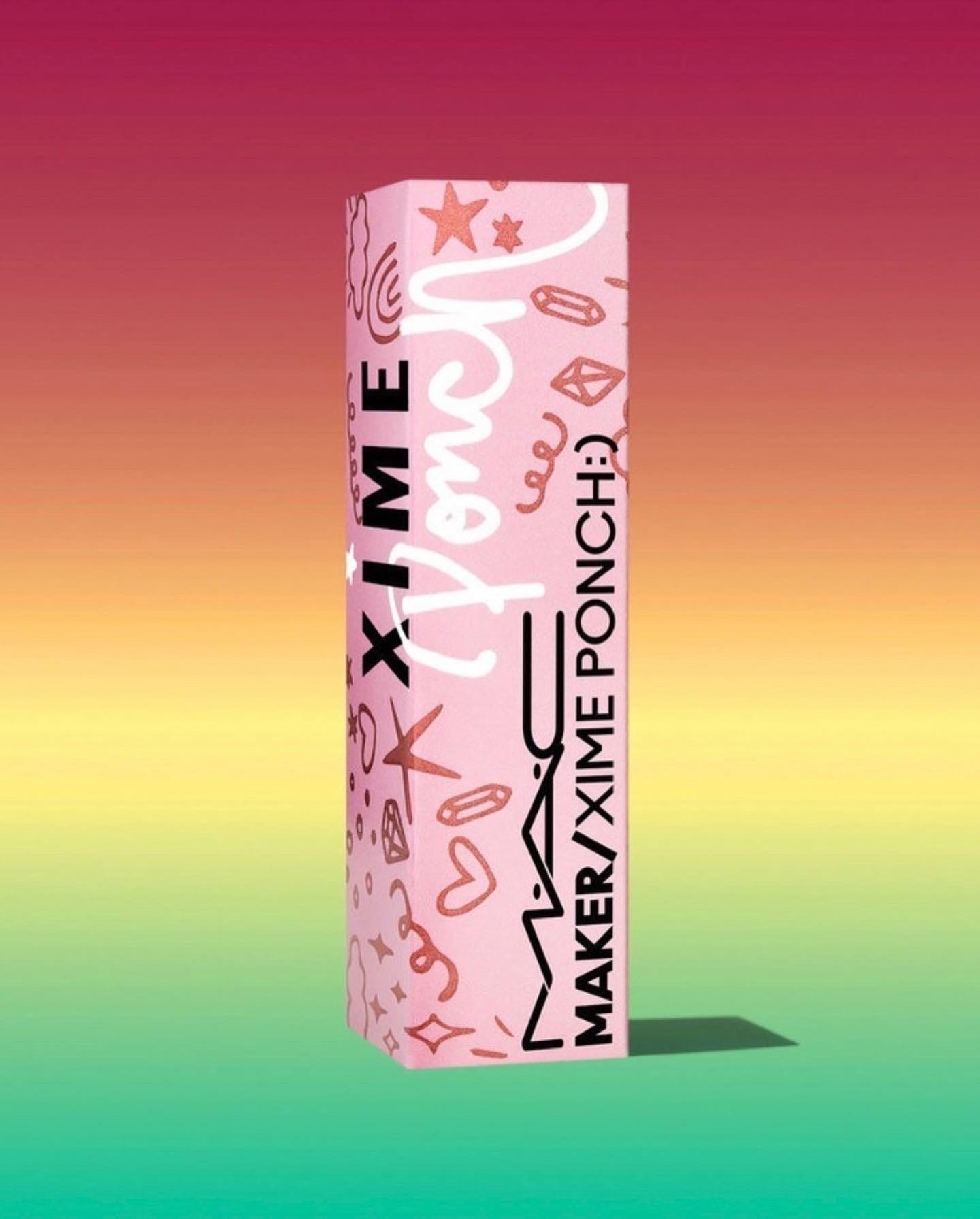 Limited-edition MAC Maker lipstick packaging box for the Xime Ponch collaboration. The exterior features a vibrant pink metallic finish with playful, hand-drawn doodles and Xime’s signature, symbolizing the blend of heritage beauty and Gen Z authenticity.