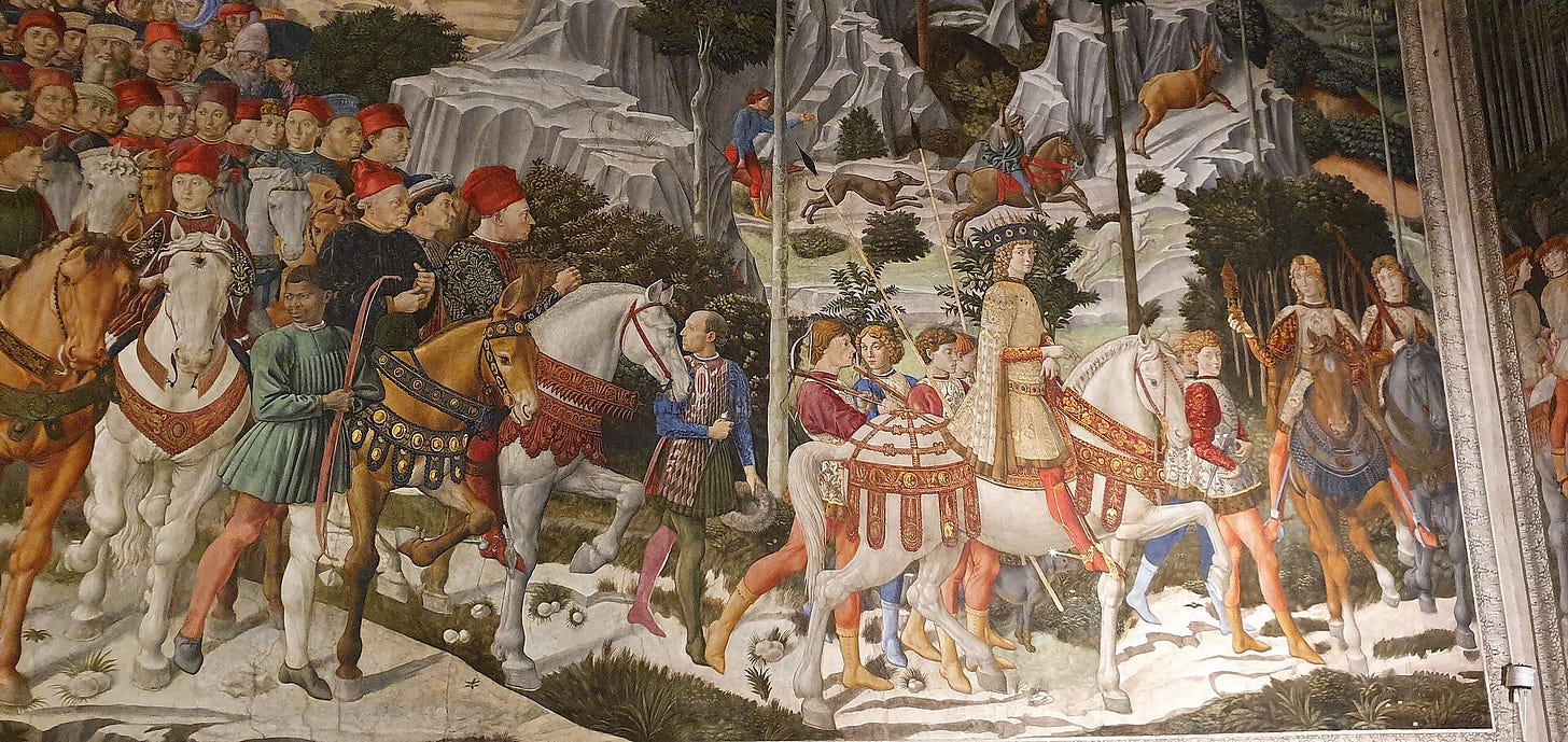 A long cavalcade of riders in rich brocades and red caps winds through a hilly landscape, led by a young king in gold on a white horse.