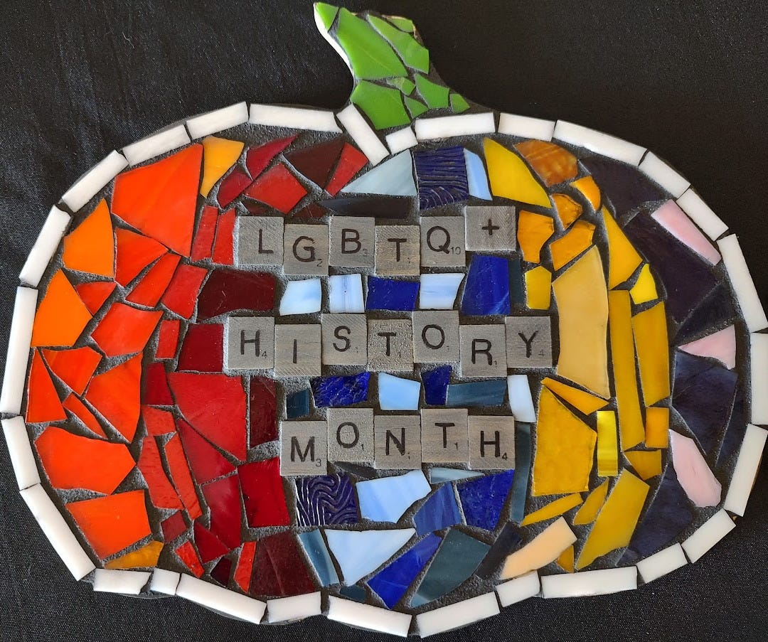 Stained glass mosaic rainbow pumpkin commemorating LGBTQIA History Month.