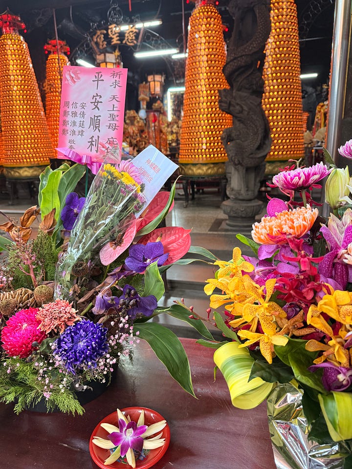 Flowers at a temple in Taiwan; flowers in St. John's Episcopal Cathedral in Taipei