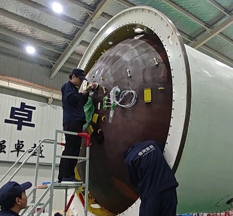 First and second-stage hardware for Zhihang-1 with a YF-102V engine installed at Zenk Space's manufacturing facility.