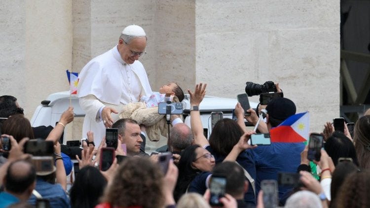 Pope Leo greeting pilgrims in the popemobile during his first General Audience