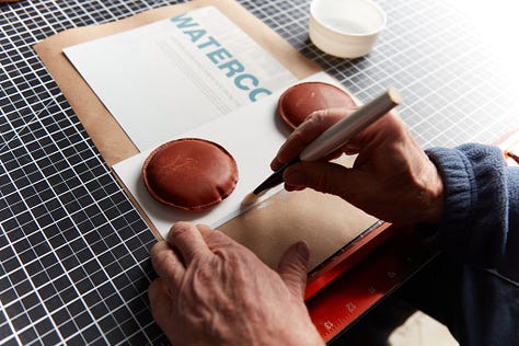 Gluing, triming, and punching a homemade linen hinge