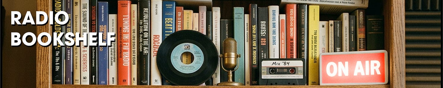bookshelf with radio books, novels, memoirs, a 45 record, a mic, a cassette and on-air sign