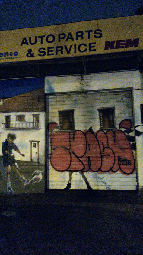 Graffiti on shops, building walls, trucks, underpasses and bus stops.