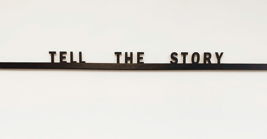 a sign that says tell the story on it