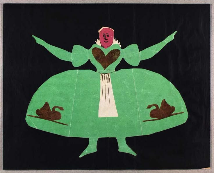 This may contain: a paper cut out of a woman in a green dress with hearts on her chest