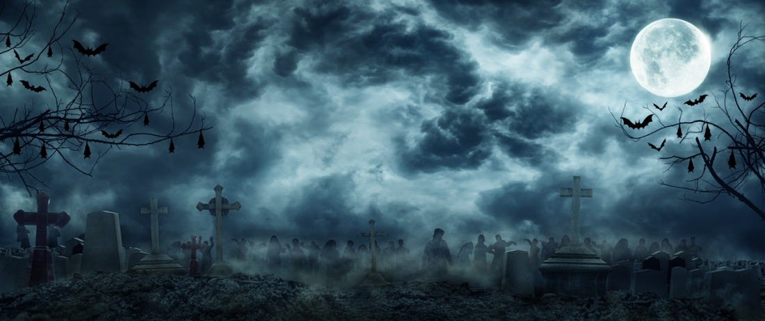 Zombies rise out of a graveyard